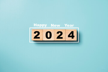 2024 year on wooden block cube for preparation new year change and start new business target...