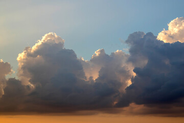 Naklejka na ściany i meble Clouds at sunset, amazing sky, nature background