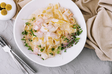 tagliatelle pasta with salmon with parmesan in cream sauce