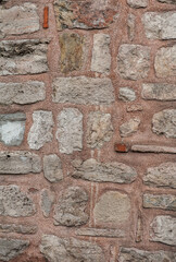 Grunge wall background with old stones texture