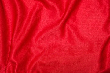 Red smooth fabric wave texture background.Love Valentine day wallpaper concept.