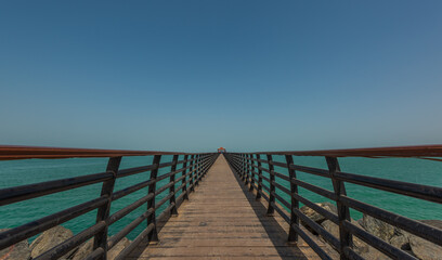 Fototapeta premium wooden bridge over the sea