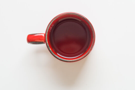 red cuo of tea on white background