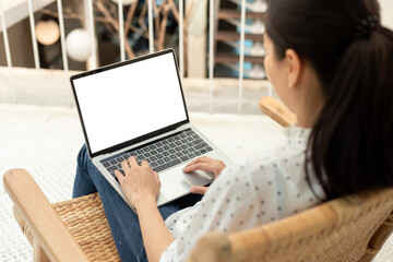 computer screen blank mockup.hand woman work using laptop with white background for advertising,contact business search information on desk at coffee shop.marketing and creative design