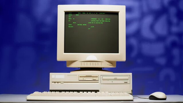 Retro pc with loading code console, programmer making scripts, green basic screen, Old computer studio blue night background close-up, Desktop vintage retro wave display, late 90s PC.