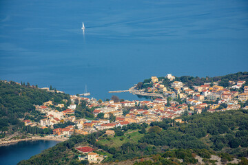 view of beautiful kassiopi village in north corfu greece