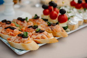 sandwiches with salmon, canape  with salmon. 