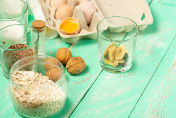 Ingredients for making oatmeal cookies on the table. Homemade oatmeal cookies