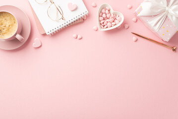 Fototapeta na wymiar Valentine's Day concept. Top view photo of notebook stylish glasses pen heart shaped saucer with sprinkles present box and cup of coffee on isolated pastel pink background with empty space