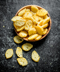 Crumbs of white bread in a bowl.