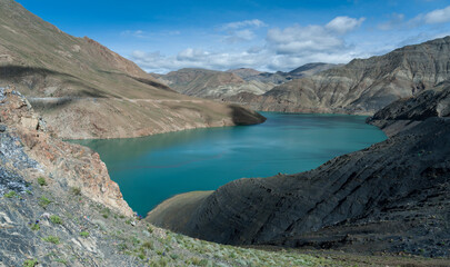 Fototapeta na wymiar Hydroelectric Yamdrok-tso lake at Sim or Simu La pass, along Southern Friendship Highway, Tibet.