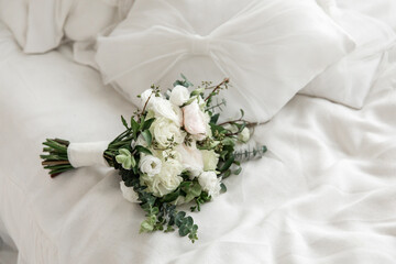 Bride's bouquet with white flowers. Wedding ceremony.