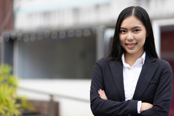 Portrait businesswoman attractive asian woman looking and smiling.