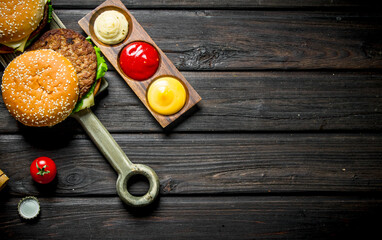 Burgers with beef and sauces.