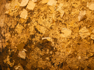 Gold is commonly used in Buddhist activities. as an offering and show faith