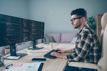 Photo of confident busy coder dressed eyewear typing application modern gadget indoors workplace...