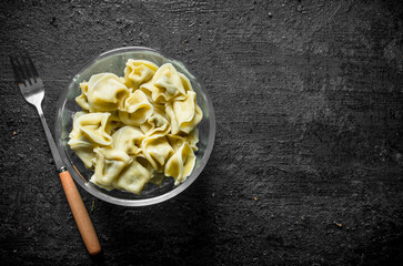 Dumplings in a glass bowl.