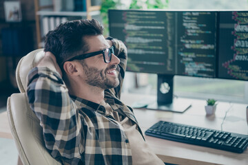 Profile photo of satisfied glad cybersecurity expert sitting chair hands behind head open space...