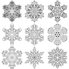 Set of winter Snowflakes. Hand drawn decorative vector illustration for coloring