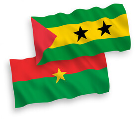Flags of Saint Thomas and Prince and Burkina Faso on a white background