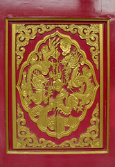 NONTHABURI, THAILAND - January 16, 2023 : Wooden door golden dragon at Dragon Temple Kammalawat or Wat Lengnoeiyi is a chinese temple in Thailand