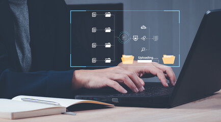 IT staff working with Document Management System (DMS), online documentation database and process automation to efficiently manage files, Corporate business technology.