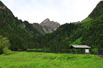 Fototapeta na wymiar Viewpoint on the Plagnes lake which is located in Haute-Savoie in the municipality of Abondance