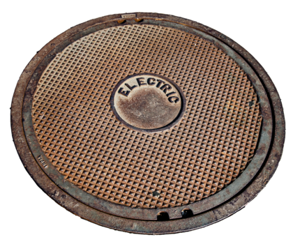 Round manhole lid covering an access point to electrical circuitry, transparent PNG.