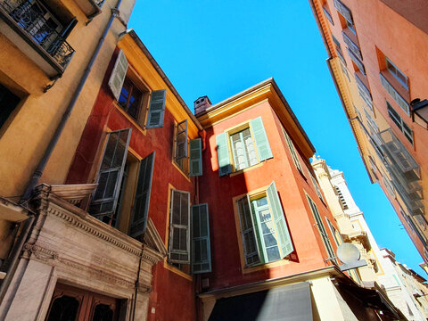 view of buildings and architecture, walls and windows of Italian architecture in Nice in the south of France. Old city Cote d'Azur