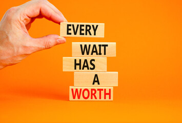 Every wait has a worth symbol. Concept words Every wait has a worth on wooden blocks. Beautiful orange table orange background. Businessman hand. Business Every wait has a worth concept. Copy space.