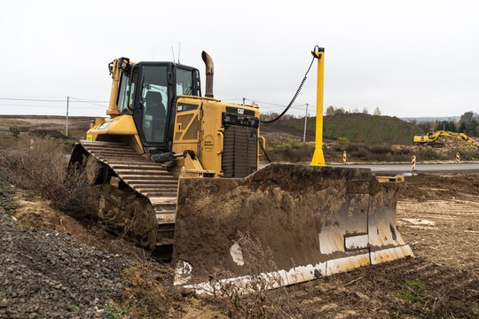 Caterpillar D6N LGP crawler dozer with a metal blade for pushing material. CAT bulldozer at construction site on November 6, 2022 in Luczyce, Poland.