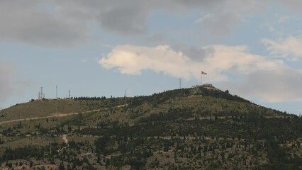 Bosnian Flag on a Hill, Patriotic Symbol, Bosnia and Herzegovina, Wide shot