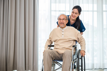 Fototapeta na wymiar Happy curator person doctor pushing wheelchair and run elderly disabled patient freedom raising arm at hospital, senior retired man sitting on wheelchair having fun with young woman nurse, health care