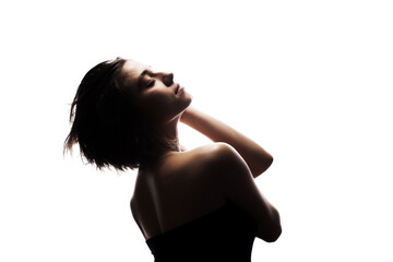 Half silhouette portrait of a girl with short hair and hands up. Isolated against white background. .