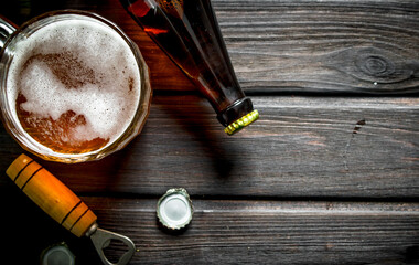 Beer and opener with a cover.