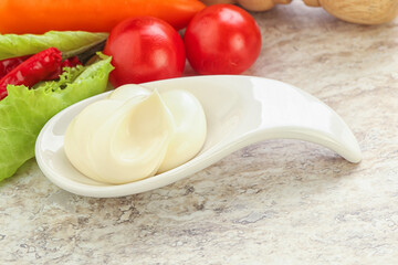 Organic mayonnaise sauce in the bowl