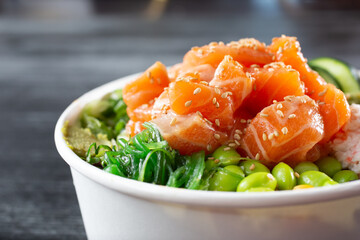 A closeup view of a salmon poke bowl. © DAVID