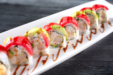 A closeup view of an ahi tuna avocado sushi roll.
