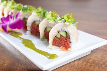 A view of a Mexican yellowtail sushi roll.