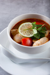 A view of a Thai hot and sour chicken soup known as tom yum gai.