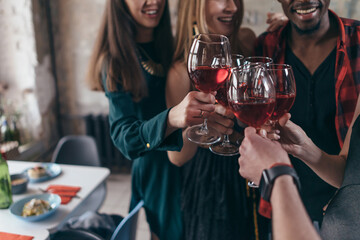 Group of friends having drinks at pub.