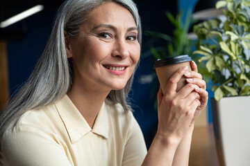 cinematic image of a senior business woman
