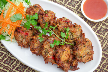 Deep fried spicy minced pork with Thai herbs, Thai food.