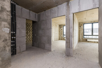 Empty concrete commercial space without finishing with partitions