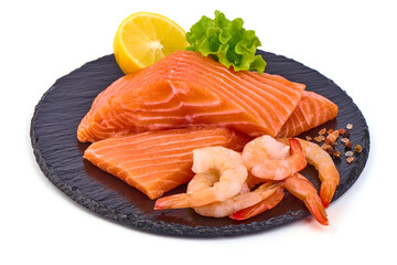Fresh salmon fillets with lemon isolated on white background.