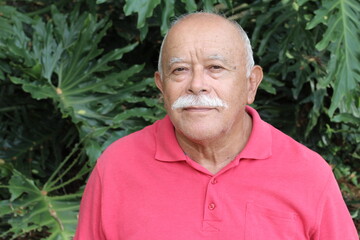 Senior ethnic bald man with a mustache 