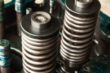Details of the main engine of the ship lubricated with grease, close-up.