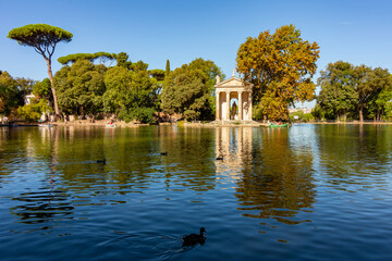 Pond with Temple of Aesculapius in gardens of Villa Borghese, Rome, Italy