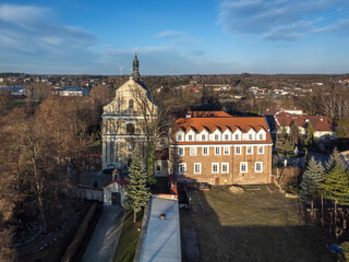 Fototapeta na wymiar Historic monastery in the city of Lutomiersk, Poland.