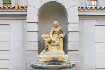 Ancient fountains with sculptures in the architecture of the city. Historical and cultural heritage Background